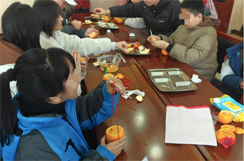 保定理工學院與安國團市委攜手共辦 “點亮一盞小橘燈，助殘接力暖童心” 關愛特殊兒童公益活動